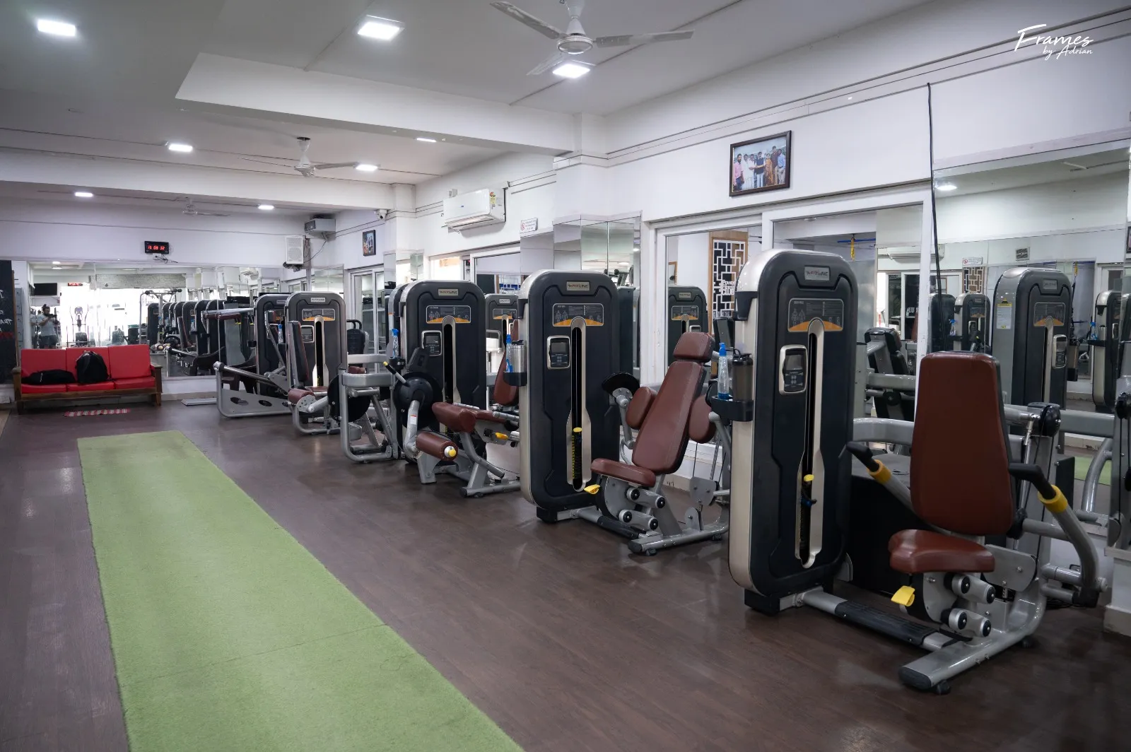 Leg strength machines arranged across the resistance-training floor.